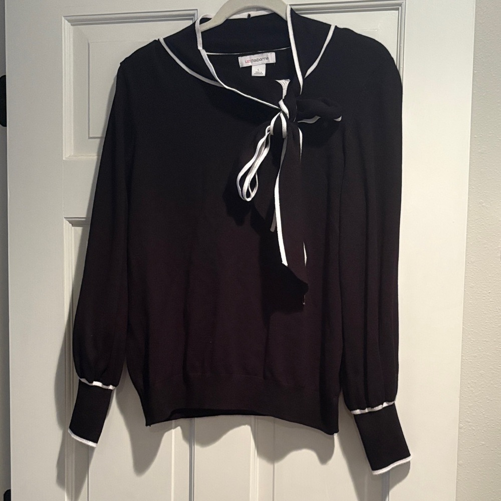 Black Sweater with White Trim and Bow
